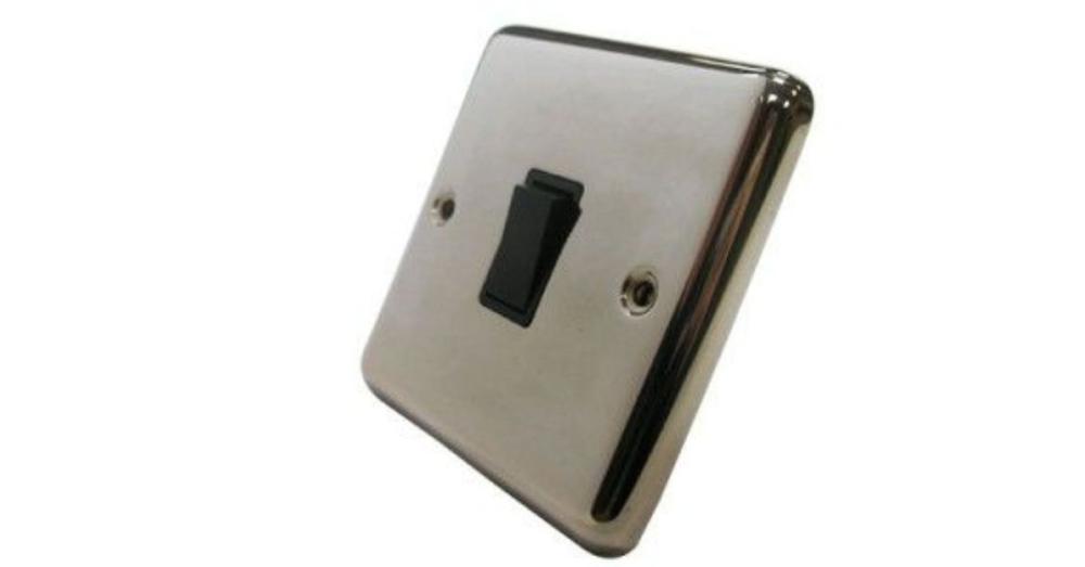 Contactum 1-gang intermediate switch in polished steel with a black insert